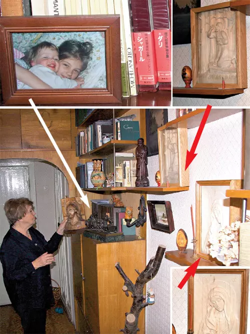 Светлана Жильцова рассматривает фото своих внучек и иконы сделанные руками мужа Серебренникова Владимира Ивановича